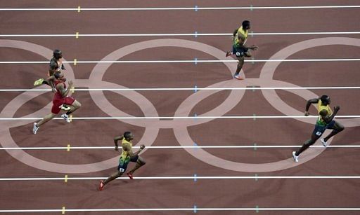 Jamaica's Usain Bolt (R), Yohan Blake and Warren Weir